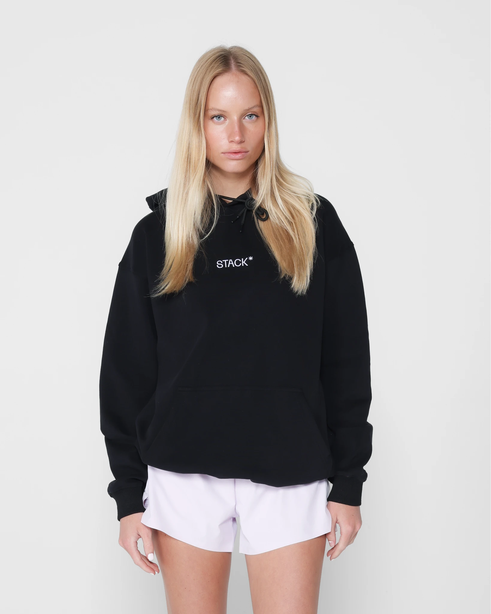 sp24-new-baseline-hoodie-womens__black__frontcrop_womens_1x_9bf79851-cfa4-4489-961f-b3fe932ae346.webp