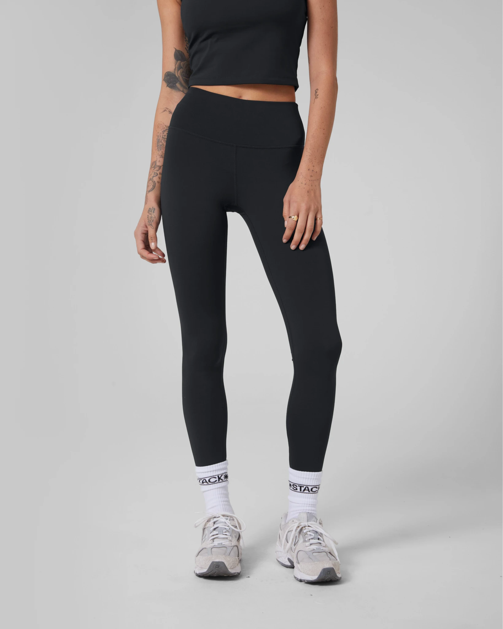 stack-embrace-legging__black__frontcrop_1x_c68a50f1-1482-4609-901d-195279df7cc9.webp