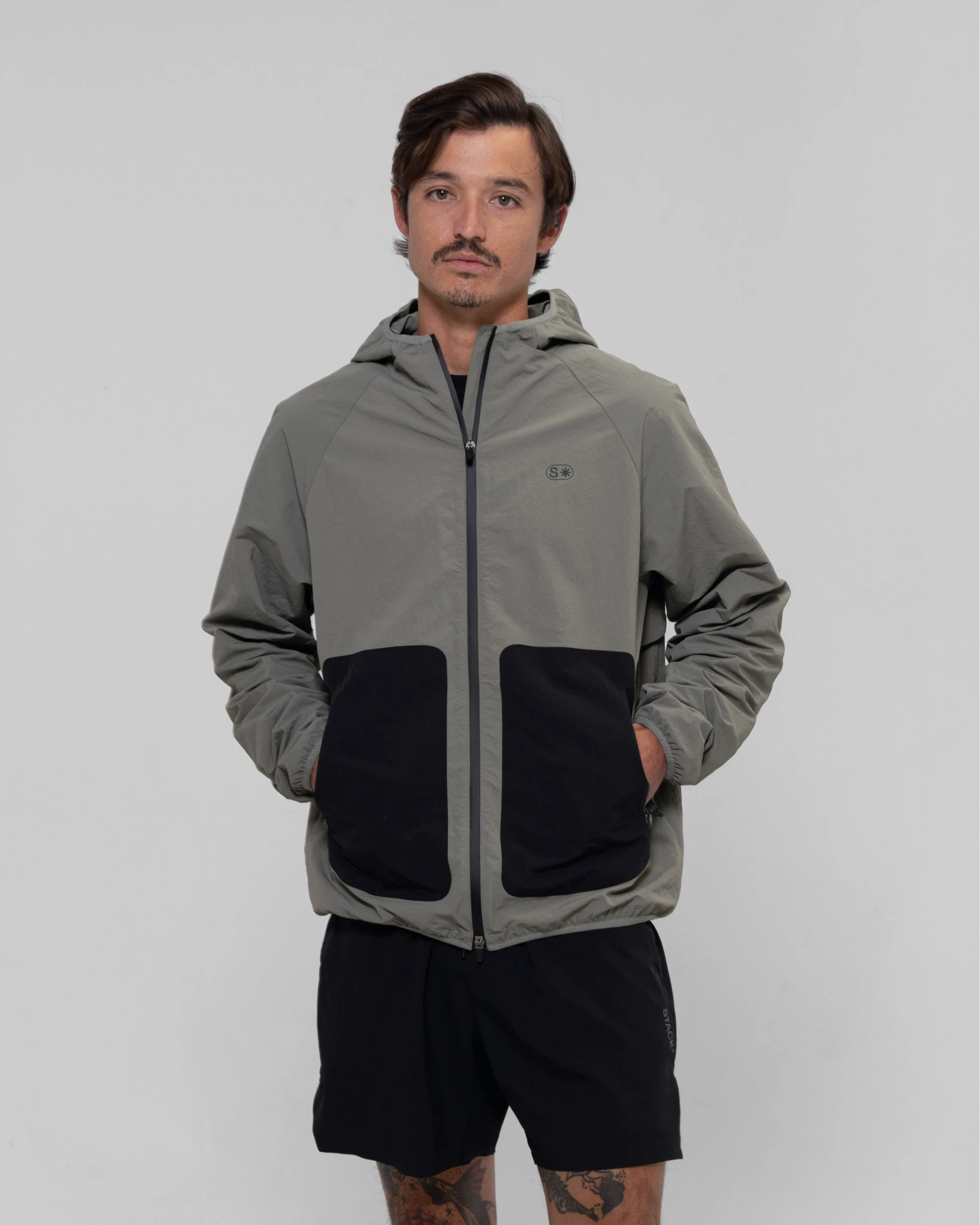 stack_aeroshell-full-zip-jacket__stone__frontcrop_1x_1b967ffe-3d29-4183-9474-0be5bad2045c.webp