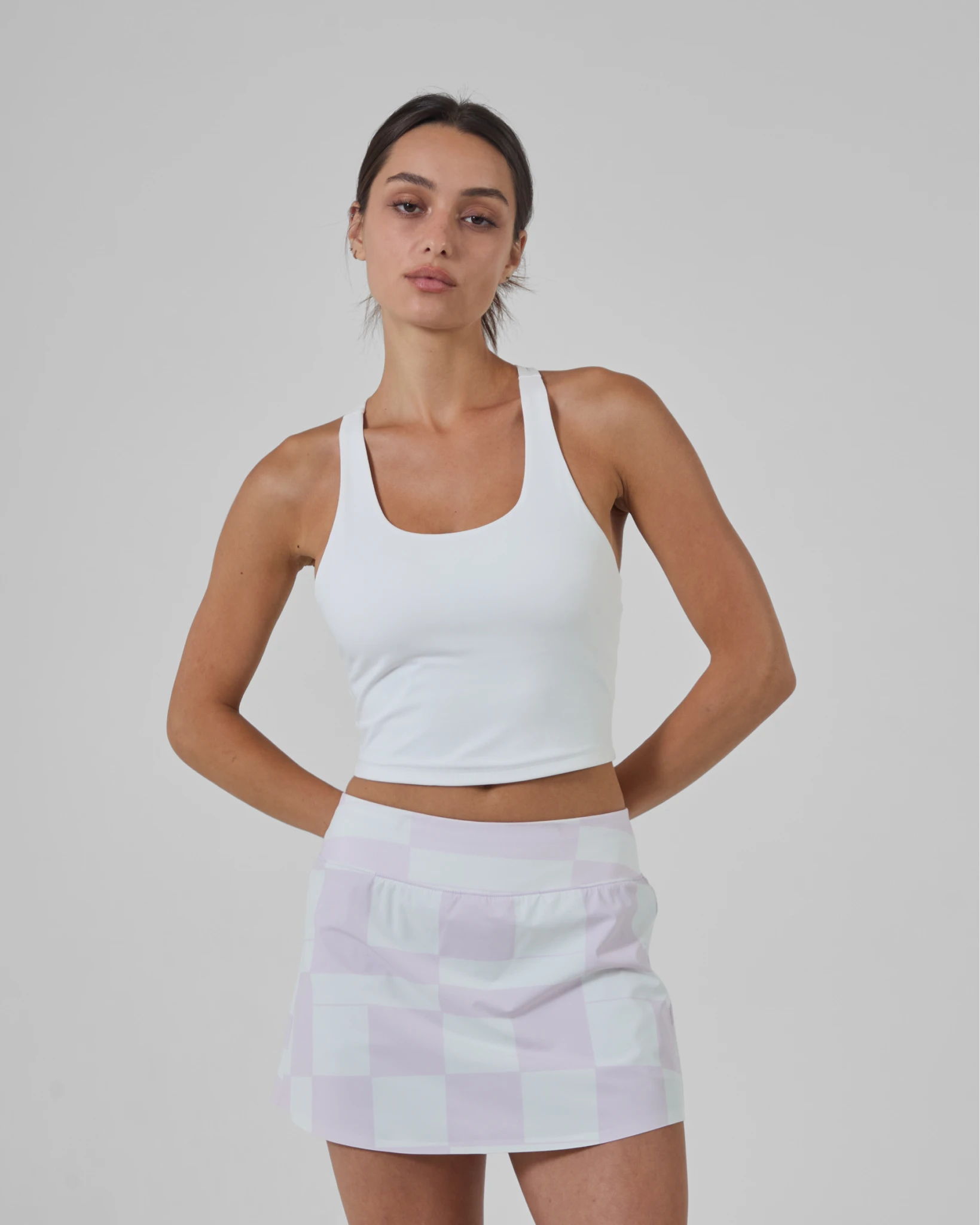 stack_rallycomp_tank__white__front_crop_1x_c6bf6165-47e7-485b-9785-6c5bebc10815.webp